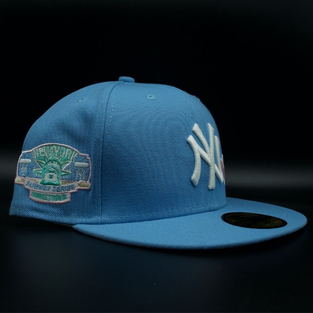 New York Yankees Sky Blue NY Logo 1998 World Series Pink Brim 59FIFTY Fitted Hat