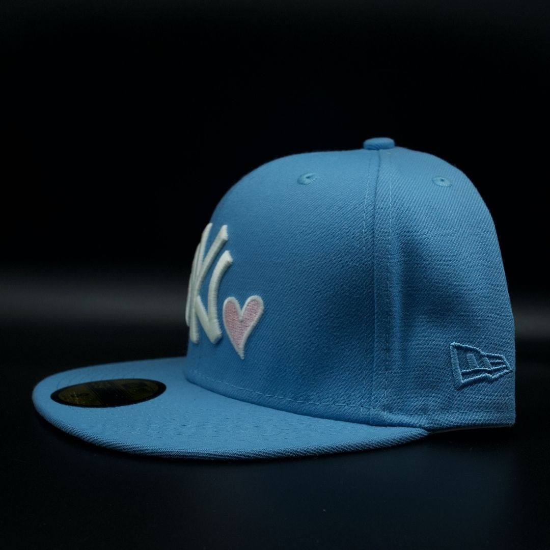 New York Yankees Sky Blue NY Logo 1998 World Series Pink Brim 59FIFTY Fitted Hat